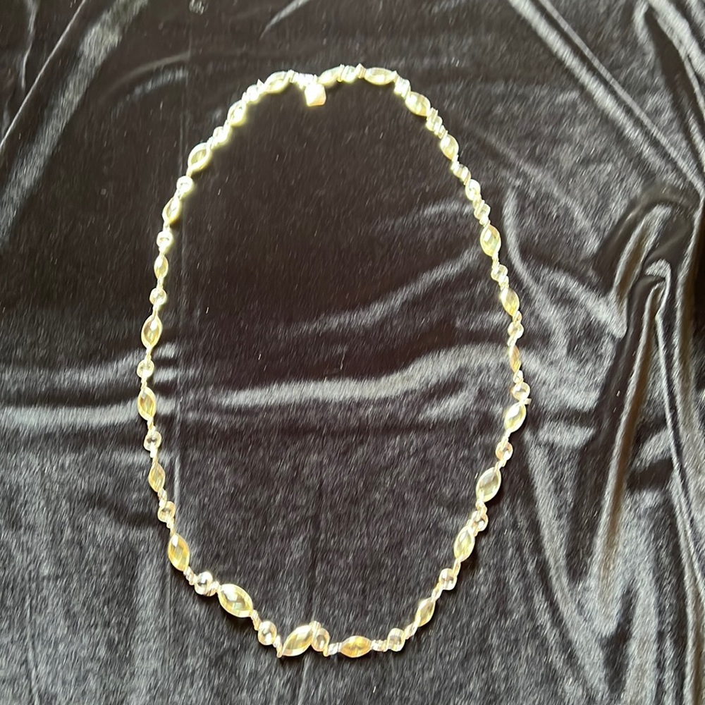 Anne Klein long necklace with pale yellow and clear faceted stones.  Never worn.
